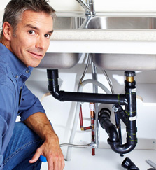 A reverse osmosis water filtration system installed under a sink