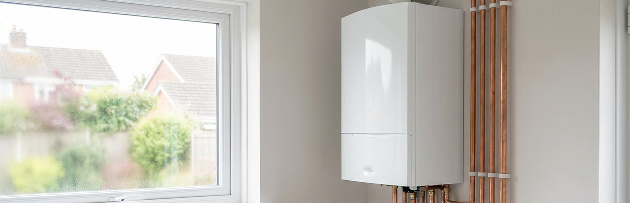 Certified plumber and gas engineer in Purley CR8 installing a modern boiler in a residential home